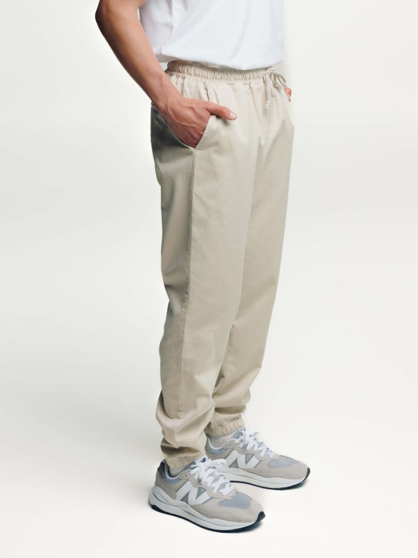 Anorakkihousut, rantahiekka