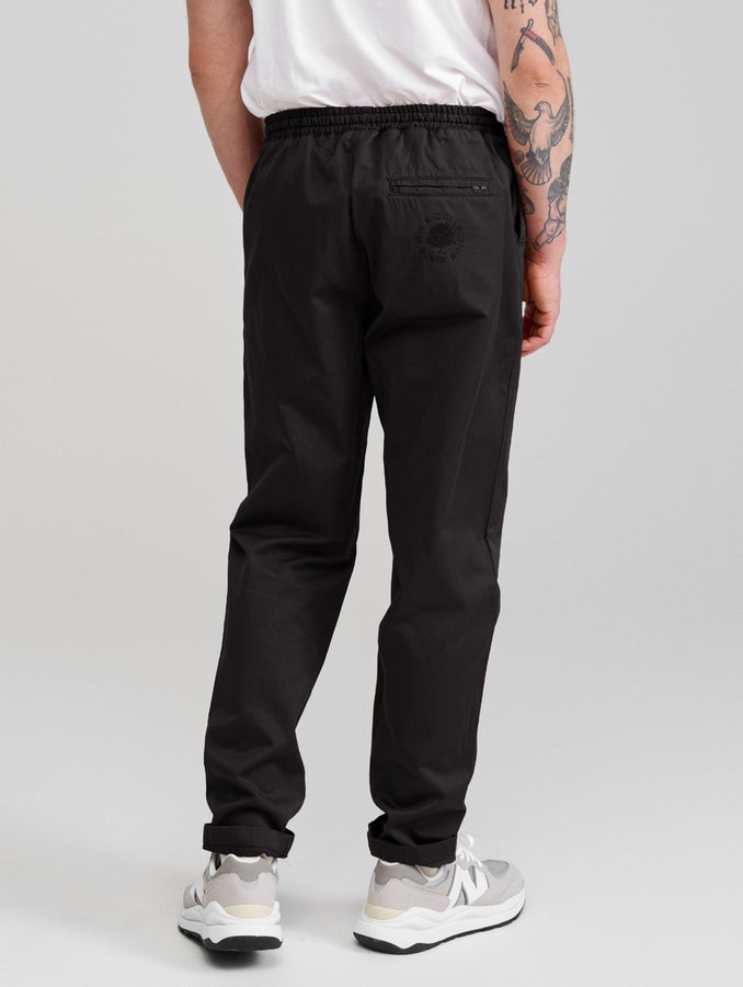 Suorat anorakkihousut, musta